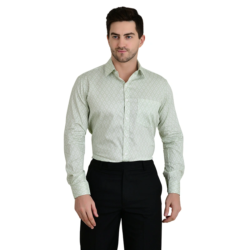 Male model in sage green diamond print full-sleeve formal shirt with black trousers - menswear ecommerce photography by Lohar Studio Delhi